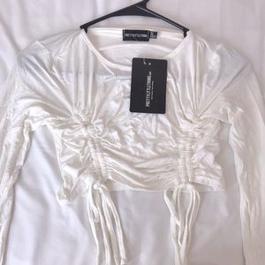 Cropped cream long sleeve